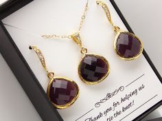 Stunning gold earring and necklace SET in burgundy color! These beautiful glass faceted beads hang from gold zirconia ear wire. The matching pendant is suspended from a cubic zirconia bail along gold filled cable chain.  Absolutely gorgeous! THIS JEWELRY SET IS ALREADY MARKED AT A DISCOUNTED PRICE, COMPARED IF BOTH ITEMS BOUGTH SEPARATELY. *Pear necklace and earring briolette: 16mm  *Earrings measure approximately 34mm including the ear wire *Necklace: 18 inches (may be 16 inches upon request) 1 Burgundy Bracelet, Burgundy Earrings, Jewelry Set Gold, Bridesmaid Jewelry Set, Earrings And Necklace Set, Etsy Bridesmaid Gifts, Bridesmaid Jewelry Sets, Earrings And Necklace, Wire Necklace