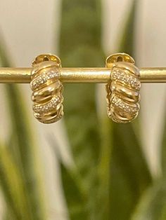 "A pair of beautiful croissant Huggies/hoop earrings with approximately 0.40 carat lab grown diamonds set in 18k yellow gold.  Lab Grown Diamonds: Our lab grown diamonds are not synthetic, or treated. These are 100% diamonds just like a natural diamonds. Only difference is that it was grown in a lab instead of the ground! Item Details * Made to Order. * Gold Kt: 18K Solid Gold * Custom Gold Color: Rose Gold, Yellow Gold, White Gold * Ready to Ship in 4-5 weeks If you have any additional question Luxury Gold Huggie Earrings Channel Set, Gold Diamond Channel Set Huggie Earrings, Yellow Gold Hoop Diamond Earrings With Baguette Diamonds, Yellow Gold Diamond Hoop Earrings With Baguette Diamonds, Gold Diamond Huggie Earrings Channel Set, Yellow Gold Baguette Diamond Hoop Earrings, Yellow Gold Cubic Zirconia Diamond Earrings, Channel Set, Yellow Gold Cubic Zirconia Channel Set Huggie Earrings, Classic Gold Plated Huggie Earrings With Diamond Accents