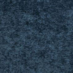 a dark blue background that looks like it has been dyed with some sort of dye