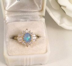 ad eBay - The classic Art Deco setting is 1.5 cm long and 1.5 cm wide. the gorgeous Opal is 8 mm long and 5 mm wide. Ring size O 1/2. (this is a smaller ring size). and set with beautiful white accent stones. and is securely claw set and the whole setting sits 9 mm high. Elegant Blue Opal Promise Ring, Blue Hallmarked Opal Ring For Wedding, Classic Blue Opal Ring As A Gift, Classic Blue Opal Ring As Gift, Classic Blue Opal Ring For Gift, Classic Blue Opal Ring Gift, Blue Opal Ring For Formal Occasions, Formal Blue Opal Fine Jewelry Ring, Formal Blue Opal Ring Fine Jewelry