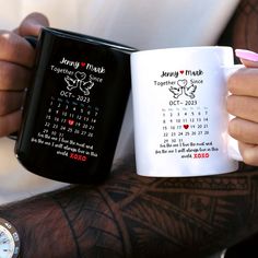 two people holding coffee mugs with tattoos on their arms and wrist, one has a date printed on it