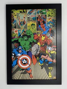 the avengers poster is framed in a black frame with an image of captain america and other superheros