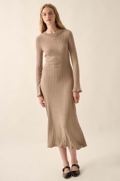 Solid, ribbed knit sweater dress. Round neckline. Long sleeves with flared cuffs. Calf length. Fitted silhouette. 100% Cotton. Imported. Designed in LA. Model wears size S. Midi Sweater Dress, Sweater Dress Midi, Ribbed Knit Sweater, Knit Midi, Knit Sweater Dress, Fitted Silhouette, Mocha, Round Neckline, Knit Sweater