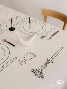 the table is covered with black and white drawings