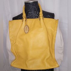 Elie Tahari Women's Leather Handbag. Yellow And Cream Color, 100% Leather, Braided Handles, And A Few Small Interior Pockets. Like New Dustbag Included. Elegant Yellow Shoulder Bag With Double Handle, Elegant Yellow Shoulder Bag With Removable Pouch, Elegant Yellow Tote Shoulder Bag, Elegant Yellow Satchel Shoulder Bag, Elegant Yellow Bag With Double Handle, Elegant Yellow Shoulder Bag With Detachable Handle, Elegant Yellow Shoulder Bag For Daily Use, Elegant Yellow Shoulder Bag For Everyday Use, Elegant Yellow Satchel Bag