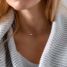 "Dainty white pearls shimmering along a classic, minimal chain. The ultimate short necklace that you can wear day or night.  D E T A I L S: * Beautiful dainty chain * Three genuine freshwater pearls. Each is approx 3mm in size.  * Quality 14kt gold fill, rose gold fill, or sterling silver chain & components * Comes in a cute little package ready for gifting L E N G T H: * Length shown in the photo is 14\" on a XS size neck  * Comes in a variety of lengths to choose from HANDMADE WITH LOVE * All Simple Pearl Chain Necklace, Minimalist Pearl Necklace With Adjustable Chain, Dainty Pearl Necklace For Everyday, Simple Everyday Pearl Necklace With Clavicle Chain, Simple Everyday Pearl Clavicle Necklace, Minimalist Pearl Chain Necklace For Anniversary, White Pearl Jewelry, Jewelry Delicate, Silver Chain Style