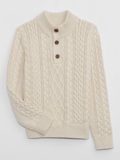 Kids Cable-Knit Mockneck Sweater | Gap Factory Winter Crew Neck Henley With Buttons, Classic Cotton Turtleneck For Winter, Classic Henley With Button Closure For Winter, Classic Winter Henley With Button Closure, Casual Beige Turtleneck With Ribbed Cuffs, Classic Long Sleeve Henley For Winter, Casual Cream Turtleneck, White Henley For Fall, Winter Cotton Henley With Button Closure