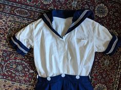 Incredibly adorable vintage 40s girls sailor dress!!. In excellent condition, the white of the shirt might have some discolorations due to age fyi. The collar and sleeve cuffs are attached by snaps and are removable. The shirt attaches to the skirt by buttons, and the skirt has a metal side zipper. 15" shoulder to shoulder 12.5" waist 16.25" pit to pit 32.5" length (19" skirt length) Sailor Outfit Aesthetic, Sailor Inspired Outfit, Vintage Sailor Outfit, Women’s Sailor Outfit, Girls Formal Wear, Sailor Aesthetic, 1940s Sailor Dress, Girls Sailor Dress, Sailor Outfit