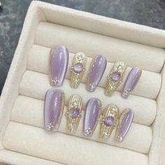 Description: Enhance your look with these stunning, high-quality press-on nails, designed to elevate any outfit or occasion. The nails feature a luxurious light purple hue with a subtle shimmer, creating a soft yet sophisticated style. Accentuated with gold metallic elements and intricate 3D pearl embellishments, these nails offer a unique and fashionable design that exudes elegance and charm. Crafted for comfort and durability, these nails are perfect for a special event, a night out, or everyday glam. Easy to apply and remove, they allow you to achieve salon-quality results in the comfort of your own home. Key Features: -Color: Light purple with shimmer finish -Design: Gold accents with 3D pearl embellishments for added luxury -Material: High-quality, durable, and reusable -Application: Purple Glitter Press On Nails, Cat Nail Art, Eye Nail Art, Transparent Nails, Cat Eye Nails, Cat Nails, Purple Cat, Nail Accessories, Metal Style