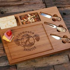 personalized cutting board with cheese, crackers and nuts