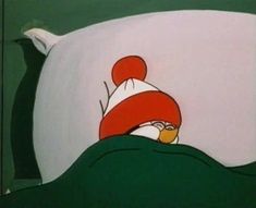 an image of a cartoon character sleeping in bed