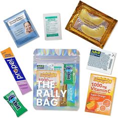 an assortment of vitamin products and packets on a white background