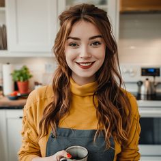 a woman is smiling while holding an object in her hands