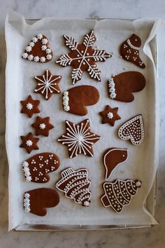 a box filled with lots of different types of cookies