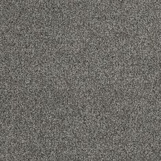 a gray carpet textured with small speckles