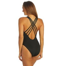 The Dolfin Aquashape Women's Solid Contemporary Deep V-Neck One Piece Swimsuit is designed for a flattering fit that combines contemporary style with supportive features for water fitness.Features Chlorine and pilling resistant Protection from the sun with UPF 50+ Deep V-neck one piece swimsuit in solid black Features scooped low, strappy back detail Front ruched waistband Center front gold metal hardware Contemporary leg cut Offers front tummy control Sewn-in cups Fully lined Offers bust enhancement Made to withstand long hours in the water while engineered to fit tightly to the body Solution swimwear designed by women for women Details Fabric: 91% Polyester / 9% Spandex Care: Hand wash in cold water after each use with mild soap. Do not use bleach, detergent, or fabric softeners. Hang dr Bust Enhancement, Water Fitness, Black Features, Long Hours, Designer Swimwear, Metal Hardware, Mild Soap, Deep V Neck, Upf 50