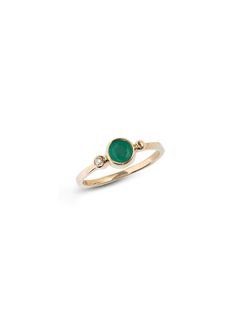 A round Emerald is delicately bezel set in a gold hammered band, along with a bezel set diamond and gold Dew Drop detail.This dainty everyday ring can be worn as a stackable set or on its own. Size: 7 Emerald Gemstone measures 5mm Diamond carat weight 0.03 14k yellow Gold Looking for a different ring size? Contact us at hello@meusshop.com Designed by Anzie Makeup Books, Everyday Ring, Hammered Band, Dew Drops, Bezel Set Diamond, Custom Ring, Everyday Rings, Diamonds And Gold, Diamond Carat