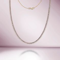 Handmade in New York of polished 14k white gold, CAPUCELLI's Tennis necklace showcases a delicate box chain embellished with dozens of shimmering white diamonds.Beautiful Diamond Tennis Necklace. A staple in your jewelry collection. Handmade in New York City of polished 14k white gold. This tennis necklace showcases a Tennis Choker Necklace, Diamond Tennis Necklace, 14k Yellow Gold Necklace, Round Sapphire, Pink Round, White Gold Necklaces, Tennis Necklace, Timeless Jewelry, Rose Gold Necklace