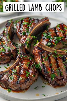 grilled lamb chops on a plate with parsley