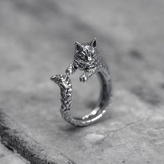 Elevate your style with this exquisite 925 Sterling Silver Cat Ring, a purr-fect addition to any jewelry collection. Handcrafted with meticulous attention to detail, this charming feline-inspired ring showcases the intricate beauty of a cat's form. The adjustable band ensures a comfortable fit for all sizes, making it an ideal gift for cat lovers and bohemian fashion enthusiasts alike. Crafted from high-quality 925 sterling silver, this ring boasts durability and a lustrous finish that will stan Silver Cat Ring, Viking Ring, Masonic Ring, Sterling Silver Cat, Retro Ring, Cat Ring, Animal Rings, Silver Cat, Handmade Rings