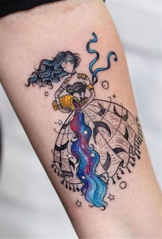 a woman's arm with a colorful tattoo design on the left side of her body