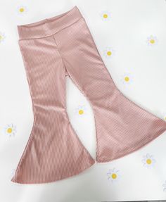 Pink ribbed bell bottom pants for kids!  Super cute and stylish bell bottoms for babies and children. Pair with a coordinating sweater or a simple body suit! Playful Wide Leg Bottoms For Spring, Playful Wide Leg Spring Bottoms, Playful Wide-leg Bottoms For Spring, Spring Non-stretch Flared Hem Pants, Stretch Bottoms For Spring, Cute Stretch Bottoms For Fall, Cute Wide Leg Spring Bottoms, Cute Fitted Bottoms For Playwear, Playful Fitted Bottoms For Fall