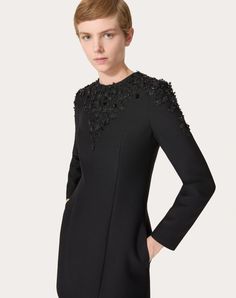 Embroidered Crepe Couture short dress - Micro element embroidery - Rear zip closure - Crepe Couture (65% virgin wool, 35% silk) - Habotai lining (87% silk) - Length: 87 cm/ 34.2 in. from the shoulders in an Italian size 40 - The model is 176 cm / 5'9" tall and wears an Italian size 40 - Made in Italy The look of the model is completed by a Valentino Garavani Locò Bag and Valentino Garavani Shoes. Elegant A-line Mini Dress With Floral Embroidery, Elegant Long Sleeve Embroidered Dress With Floral Details, Knee-length Embroidered Evening Dress, Elegant Long Sleeve Embroidered Floral Dress, Elegant Knee-length Embroidered Formal Dress, Elegant Silk Embroidered Formal Dress, Fitted Elegant Dress With 3d Embroidery, Formal Floral Embroidered Mini Dress, Elegant Fitted Dress With 3d Embroidery