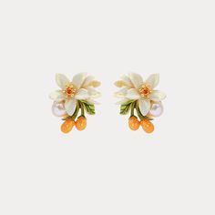 Orange Blossom Earrings show orange flower beauty and set off charming earlobes. They have enamel paint to look more vivid. These are nature jewelry from Selenichast jewelry store. Our Orange Blossom Earrings have been crafted from fine brass and enamel to create a beautiful, timeless look. Hang these perfectly balanced earrings from your lobes for an eye-catching addition to any outfit. Their subtle hints of color and cottage-inspired design make them the ideal gift for a loved one. Allow them Lily Of Valley, Fleur Orange, Fruit Jewelry, Orange Earrings, Dope Jewelry, Funky Jewelry, Orange Flower, Jewelry Lookbook, Enamel Paint