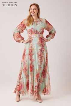 Step into sophistication with this printed chiffon maxi gown! This enhancing ensemble entails a mesmerizing mint colorway, an alluring jewel pleated neckline, defined waist, and a gracefully flowy skirt. Wear this stunning piece to a destination wedding or formal spring affair. Pair with gold accessories to complete the look. Color: Mint Multi Jewel Neckline Long Sleeves Pleated Skirt Floor Length Wear to destination weddings, cocktail parties, and semi-formal events ¬† Black Tie Party, Pleated Gown, Ruched Maxi Dress, Teri Jon, Maxi Gown, Skirt Maxi, Floor Length Gown, Pleated Maxi, Chiffon Gown