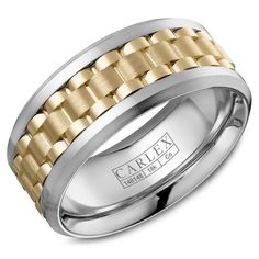 a men's wedding band with two tone gold and silver inlays on it