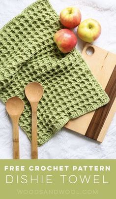 a crocheted dish towel with wooden spoons and apples