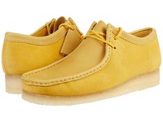 Low-top Leather Moccasins With Suede Lining, Suede Low-top Moccasins With Contrast Sole, Casual Low-top Moccasins With Contrast Sole, Classic Low-top Moccasins With Suede Lining, Low-top Suede Moccasins For Work, Casual Yellow Loafers With Rubber Sole, Yellow Leather Moccasins With Rubber Sole, Low-top Moccasins With Rubber Sole For Work, Clarks Wallabees Men