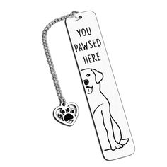 an engraved bookmark with a dog's paw on it