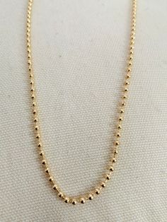 Chain Length: 20", 24" Chain Width: 3mm About Gold Filled Jewelry:What is gold-filled? We carry gold filled jewelry that is composed of a solid layer of 18kt gold, that is bonded to a base metal. Gold Filled and vermeil jewelry are great quality alternatives to solid gold. With proper care and storage, you will have jewelry that will last a lifetime. Tips to make your jewelry last:1. Keep it dry. Store your jewelry in the plastic bag included in your purchase.2. Avoid harsh chemicals such as per 14k Gold Ball Chain Necklace, Gold Necklace Women, Vermeil Jewelry, Gold Filled Earrings, Chain Anklet, Pendant Bracelet, Gold Filled Jewelry, Stainless Steel Necklace, Chains For Men