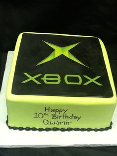 a birthday cake with the name x - box on it