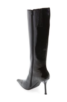 A smooth upper and pointy toe add contemporary allure to a striking boot elevated by a slender, stacked heel. 3 3/4" heel 13 1/2" shaft; 12" calf circumference. Narrow calf Side zip closure with elastic gore inset Synthetic upper/leather and textile lining/synthetic sole Imported Jeffrey Campbell Boots, Pointed Toe Boots, Platform Slippers, Pointed Toe Shoes, Designer Clothes For Men, Autumn Fashion Women, Jeffrey Campbell, Stacked Heel, Brown Boots