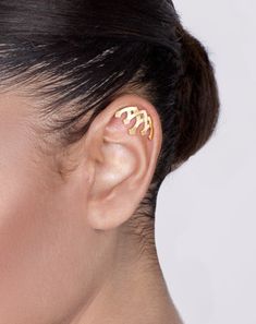 a woman with ear piercings on her ears