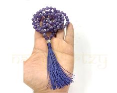 Handmade Customized 108 Beads Mala/Necklace with Natural 8mm Amethyst Gemstone - Guru Bead German Silver Hand-Knotted Mala Comes with unbreakable finishing.  ⩥Materials Used:  8mm Natural Amethyst ⩥Guru Bead: German Silver Bead ⩥Length: 18-20 inches  ⩥End Work Length: 3-4 Inches ⩥Thread color: Navy Blue Color (Any color of threads is available) Any kind of Customization is available. ✅This beautiful Amethyst Stone bead mala is hand-knotted on a bright & and Shine Navy Blue Colour thread to add longevity and comfort during meditation and finished with a Shining German Silver guru bead and a matching Contrast Navy Blue Colour silk tassel.✅ ↈ Chakra of Stone Used:  ⩥ Amethyst- Third Eye Chakra ⩥ABOUT AMETHYST STONES & USES  ✨Enhancing the immune system. ✨Improving endocrine function. ✨Improvi Amethyst Necklace With 108 Beads For Gifts, Adjustable Mala With Polished Beads As Gift, Amethyst Necklace With 108 Beads As A Gift, Purple Beaded Necklaces With 8mm Beads As Gift, Purple Beaded Necklaces With 8mm Beads For Gifts, Purple Beaded Necklace With 8mm Beads As Gift, Gemstone Beads Mala As Gift, Round Gemstone Beads Mala As Gift, Buddhist Mala