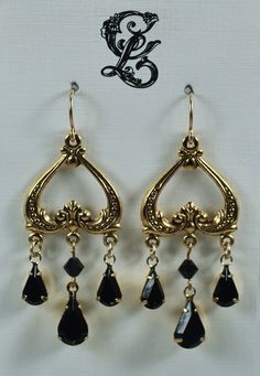 Vintage Victorian inspired chandelier earrings. Size: 3/4" wide earrings dangle 1 3/4" (44 mm) from gold-filled, nickel free ear wires.   Notice the beaded swirls on these inverted antique reproduction inverted hearts.  There are three jet Swarovski crystal teardrops dangling from the heart.  The earrings are so elegant and will look just as nice in one of the other 12 Swarovski colors available.   Size: 3/4" wide earrings dangle 1 3/4" (44 mm) from gold-filled, nickel free ear wires.  These beauties are feather weight on your ears and will add the needed touch to complete your dressy outfit.  Perfect for brides, bridesmaids, and any dressy occasions.    Here are some other Vintage inspired Victorian, Art Deco and Art Nouveau  triple dangles: www.etsy.com/listing/171352261; www.etsy.com/li Vintage Earrings Victorian, Chandelier Earrings Wedding, Red Chandelier, Vintage Victorian, Pretty Earrings, Black Wedding, Bridesmaid Earrings, Wedding Bridesmaids, Earring Backs