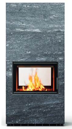 a fire burning inside of a stone fireplace