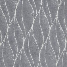 a gray and white wallpaper with wavy lines on the fabric, as well as an abstract