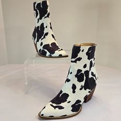 Aridergirl Women's Mid-Calf Cow Print Snip Toe Stacked Heel Western Style Boots Sz 7 - Cow Print 2022020l Condition: Nwot -Display Shoe Shows Very Minimal Signs Of Handling But No Defects. Us Size: 7 Features/Accents: Stand Out In Style: We Combine A Trendy Cow Print Faux Suede Design With Eye-Catching Boots To Bring You Small Stacked Heel That Will Take The Look Of Your Everyday Outfit’s To The Next Level Making Them Perfect For Women That Want To Stand Out. Durable & Vegan Build: Our Heel Boot Fitted Almond Toe Summer Boots, Fitted White Summer Boots, Fitted White Boots For Summer, White Fitted Summer Boots, Western Style Fitted Mid-calf Boots With Stacked Heel, Cow Print Ankle Boots, Fitted Western Mid-calf Boots With Stacked Heel, Western Mid-calf Boots With Stacked Block Heel, Stacked Heel Boots