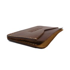 Frontside wallet. Card wallet. slim card case. leather card wallet. For those who like to keep their wallets in their front pockets. Slim enough to comfortably carry and large enough to fit your essential cards and some cash.  3/4oz Herman Oak Vegetable-Tanned Leather 2 Card-Slots, 1 center card slot Brown Wallets With Card Slots For Daily Use, Brown Leather Card Holder With Cell Phone Pocket, Casual Brown Trifold Wallet With Interior Card Slots, Casual Leather Card Holder With Card Slots, Casual Bifold Card Holder For Everyday Use, Casual Leather Card Holder With Slots, Brown Trifold Wallet With Cell Phone Pocket, Classic Brown Card Holder With Cell Phone Pocket, Casual Brown Card Holder With Coin Pocket