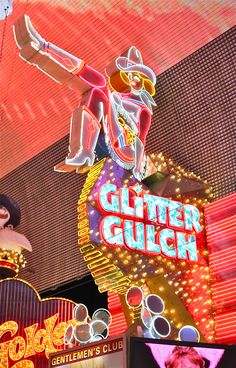 the neon sign for glitter gulch in las vegas