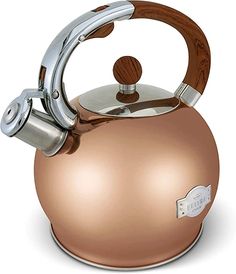 a tea kettle with a wooden handle is shown