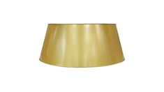 a gold lamp shade is shown on a white background and it's light yellow