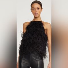 Bringing Back The “Going Out Top” Black Halter Neck Feather Top. Pairs Well With Jeans Or A White Pair Of Trousers. Ties At Neck. Size Xs - Sleeveless Halter Top - Falls To Hip Length - Black Ostrich Feathers - Fabric Content: 100% Silk Base, 100% Ostrich Feathers - Care Instructions: Dry Clean Only Glamorous Party Top With Feather Trim, Chic Fitted Feather Top, Black Feather Trim Top For Evening, Black Feather Tops, Feather Tank Top, Feather Top, Feather Tops, Black Halter, Going Out Tops