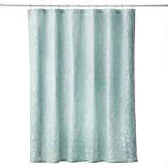 a shower curtain hanging on a metal bar