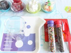 there are many items on the table to be used for making crafts such as ice cream and sprinkles