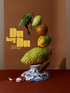 the fruit is stacked on top of each other in front of a brown background with yellow lettering